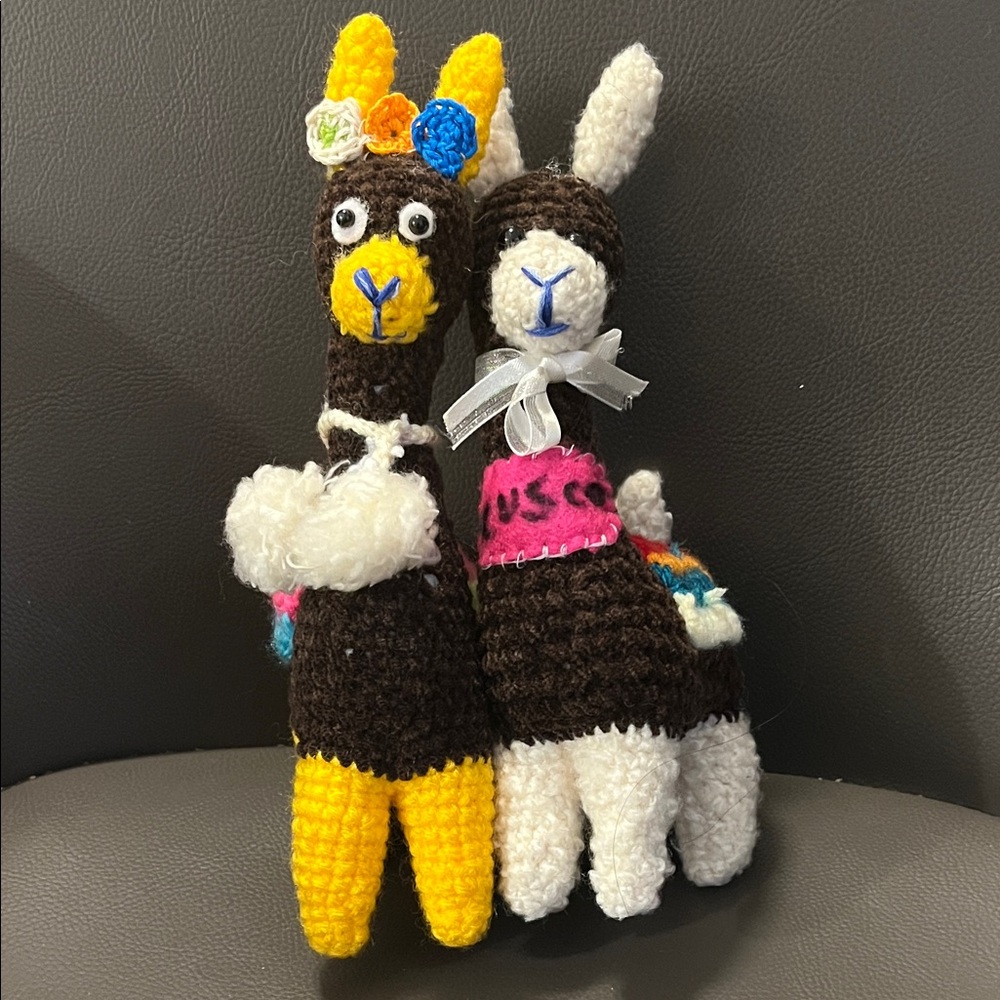 A pair of handknit Colorful Knitted Llama Plush Toys
